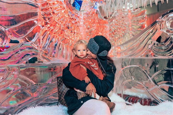 Experience the unique charm of Chillout Ice Lounge where stunning ice sculptures create a magical setting perfect for enjoying warm treats amidst the refreshing cold of Dubai's desert heat.